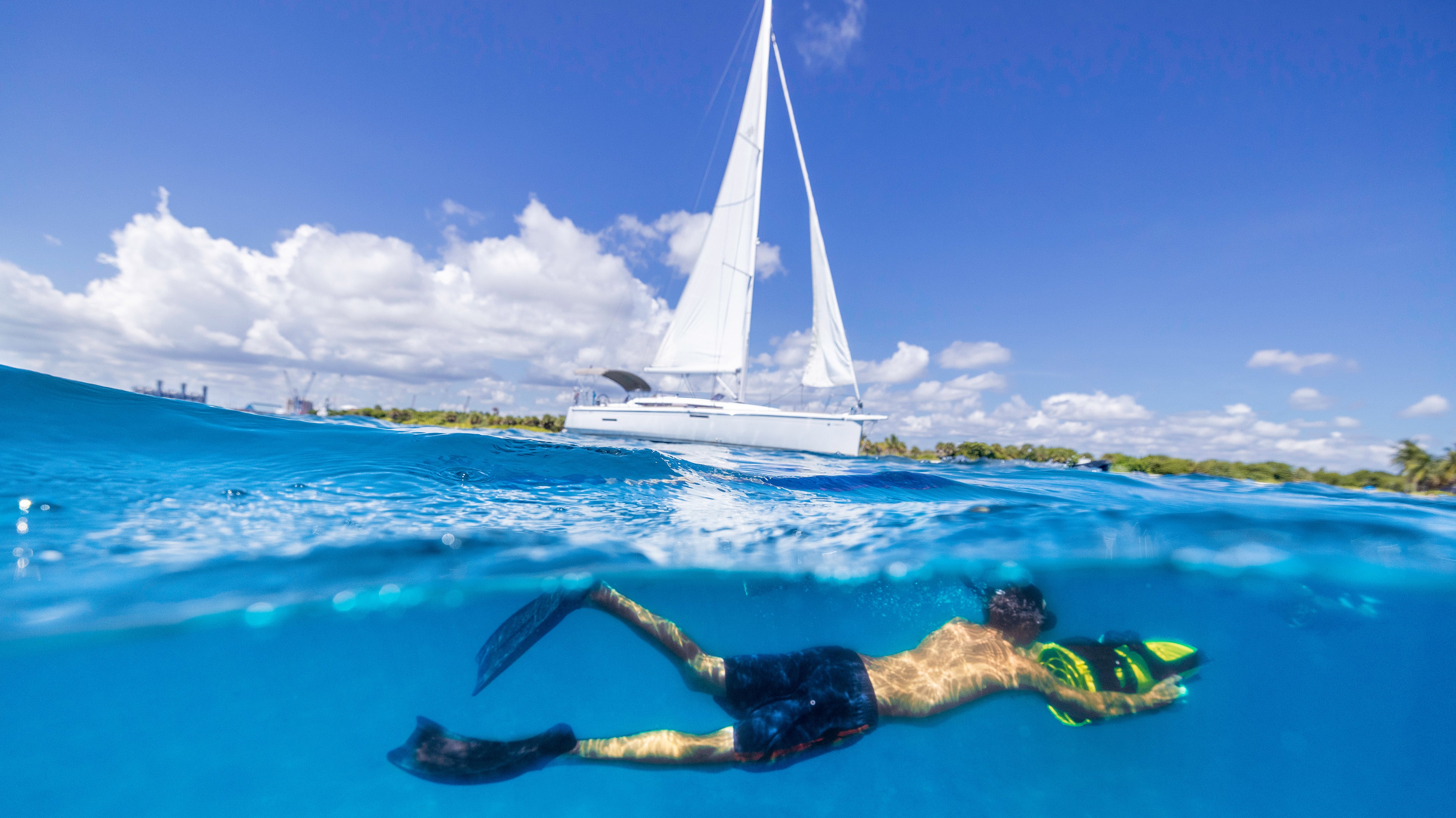 A man is exploring the ocean with Nautica Seascooters